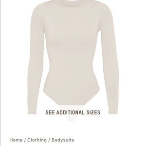 SKIMS essential bodysuit long sleeve size S/M